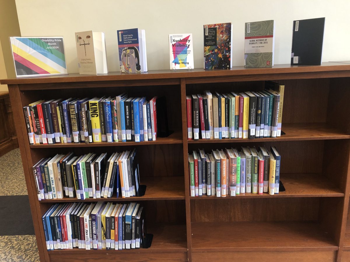 Image of low bookshelves with selected books related to disability law.